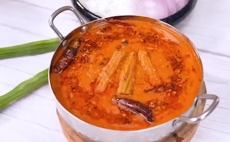 Serving the dal with tadka and accompaniments