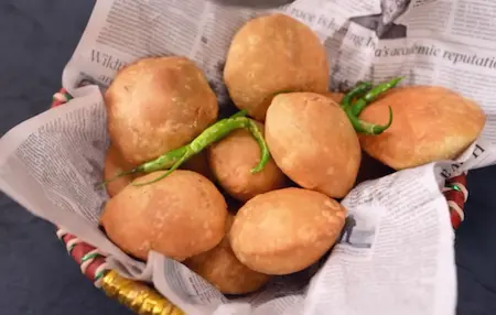 Frying Khasta Kachori till golden and crispy