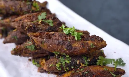 Final dish of Soya Kheema Karela served with coriander garnish and ready to eat