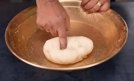 Kneading soft dough for Khasta Kachori with maida and ghee