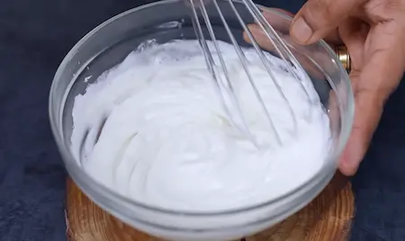 Preparing sweetened curd for samosa chaat recipe