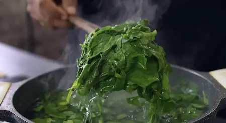 Step 1: blanching spinach and fenugreek for Methi Palak Ka Kapa