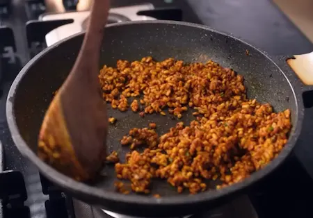 Preparing urad dal stuffing for Khasta Kachori