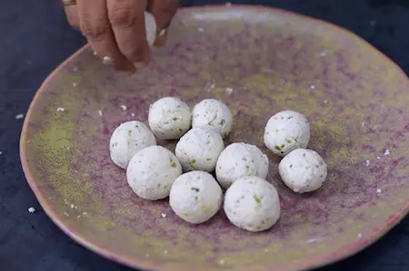 Mixing paneer, spices, and herbs for kofta stuffing