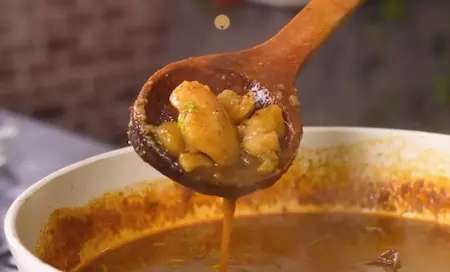 Cooking Dubki Wale Aloo in mustard oil with green masala
