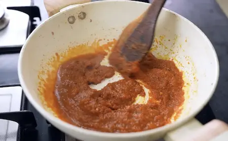 Step 4: adding spices to masala for Ghugni Chaat