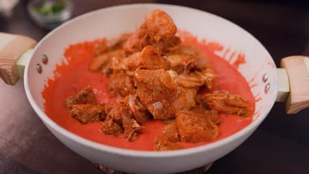 Step 4: Combining first and second marination for Hyderabadi Red Chicken