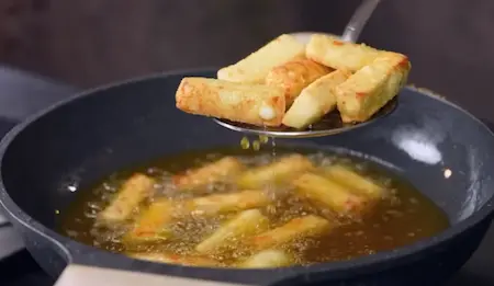Crispy golden fried paneer cubes coated in cornflour for starter dish