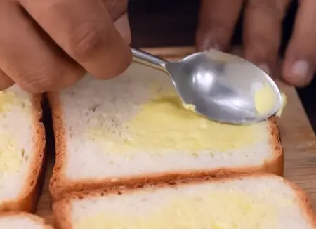 Step 4: buttering bread slices for Crispy Dahi Sandwich Recipe