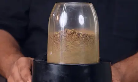 Roasting and grinding Indian pickle spices including saunf, kalonji, methi, and mustard seeds
