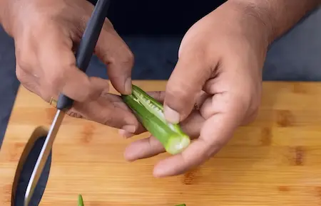 Step 1: preparing bhindi for varan bhaat and masala bhendi recipe