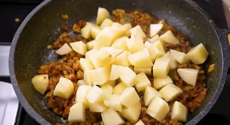 Step 7: cooking potatoes for Aloo Matar ki Sukhi Sabzi