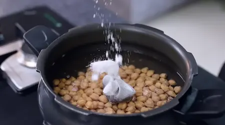 Soaking and boiling kabuli chana for samosa chaat recipe
