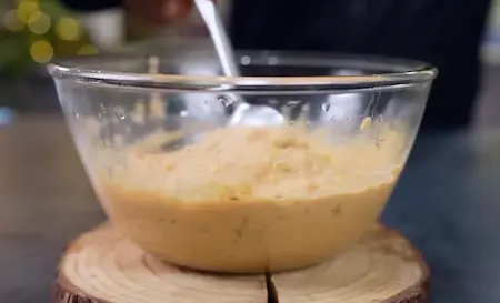 Step 2: Whisking and mixing moong dal pakoda batter