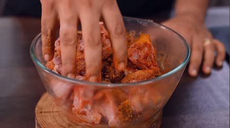 Step 1: First marination of Hyderabadi Wedding Red Chicken with dry spices and ginger garlic paste