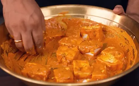 Step 2: Marinating paneer in mustard oil, spices and curd for Paneer Changezi